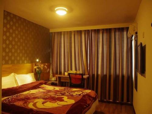 Guangyuan China Hotel Bombastico Código Promocional Booking.com
